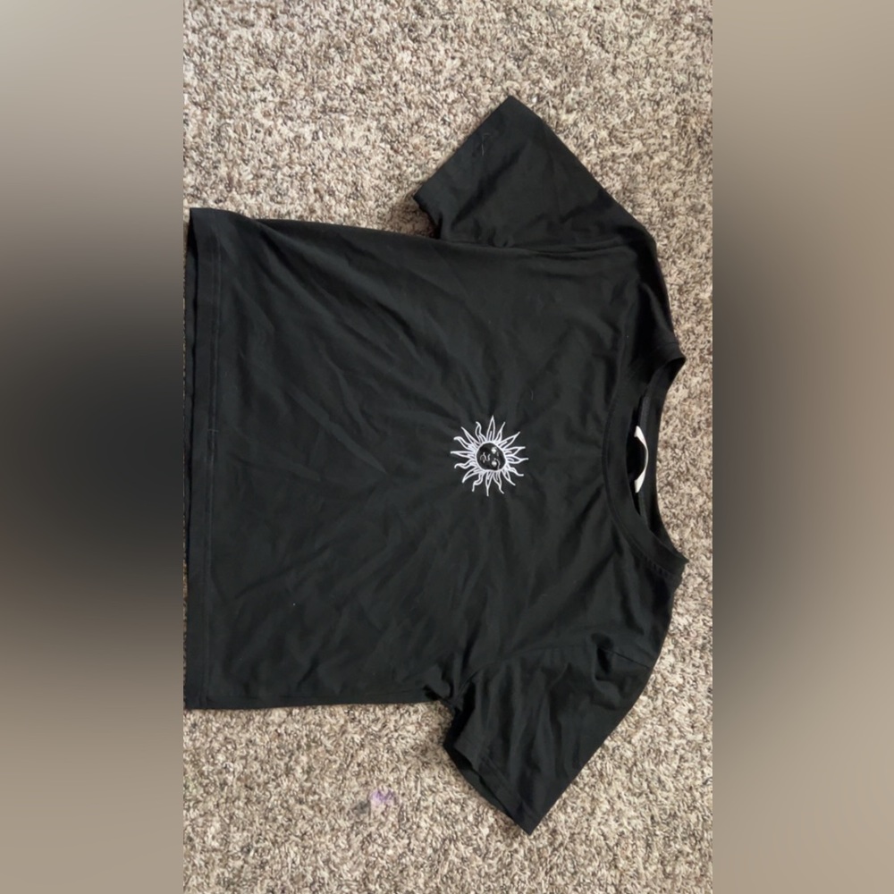All black soft and stretchy embroidered sun tee.